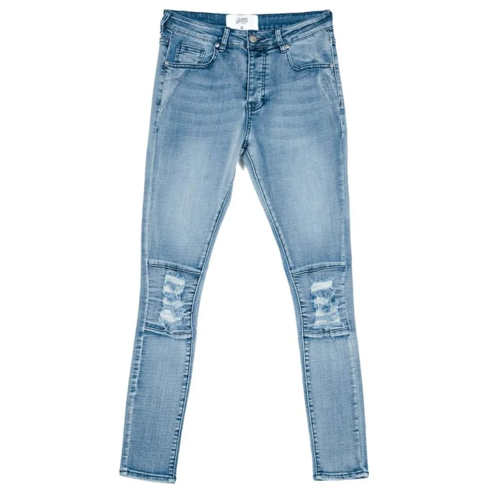 Jean biker déchiré genou bleu
